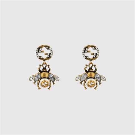 Gucci Boucles d’oreilles abeille avec détail GG